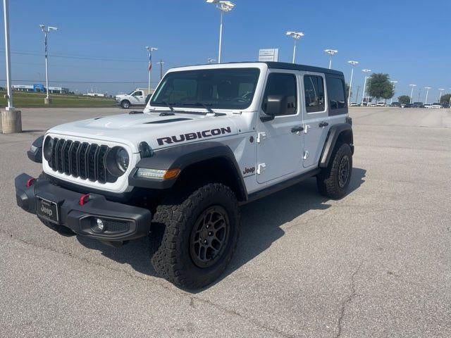 2024 Jeep Wrangler Rubicon in Bright White Clea — front three-quarter view