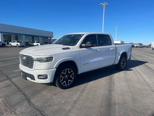 2025 RAM 1500 Laramie in White — front three-quarter view