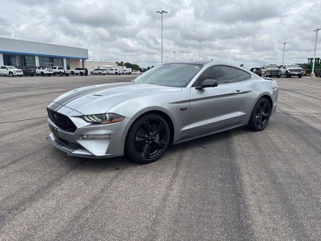 2022 Ford Mustang GT in Iconic Silver Met — front three-quarter view