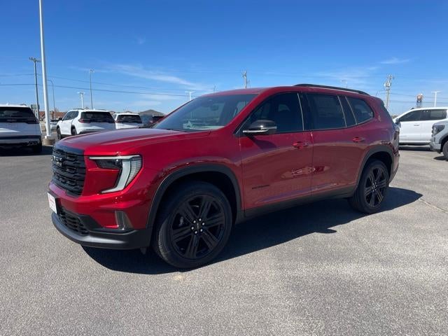 2026 GMC Acadia Elevation in Volcanic Red Tintcoat — front three-quarter view