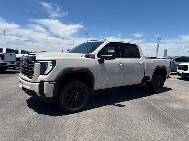 2026 GMC Sierra 2500 HD AT4 in Coastal Dune — front three-quarter view