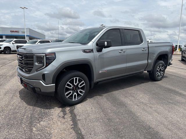 2023 GMC Sierra 1500 AT4 in Sterling Metallic — front three-quarter view