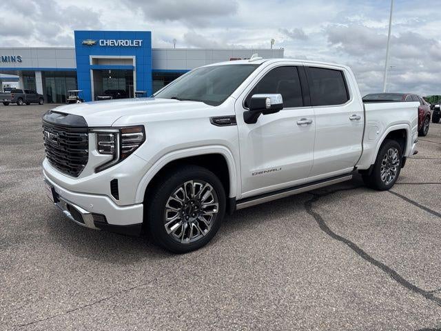 2024 GMC Sierra 1500 Denali Ultimate in White Frost Tricoat — front three-quarter view