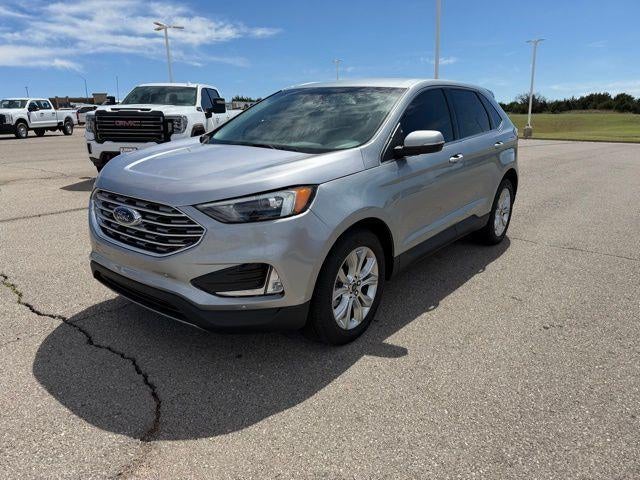 2024 Ford Edge Titanium in Iconic Silver — front three-quarter view