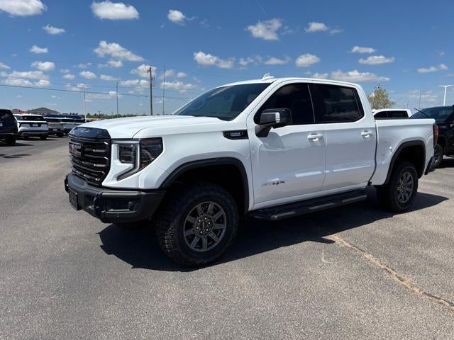 2026 GMC Sierra 1500 AT4X in Summit White — front three-quarter view