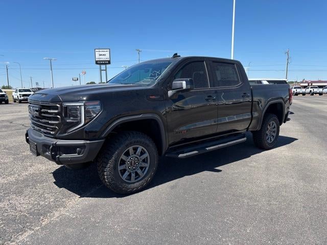 2026 GMC Sierra 1500 AT4X in Onyx Black — front three-quarter view